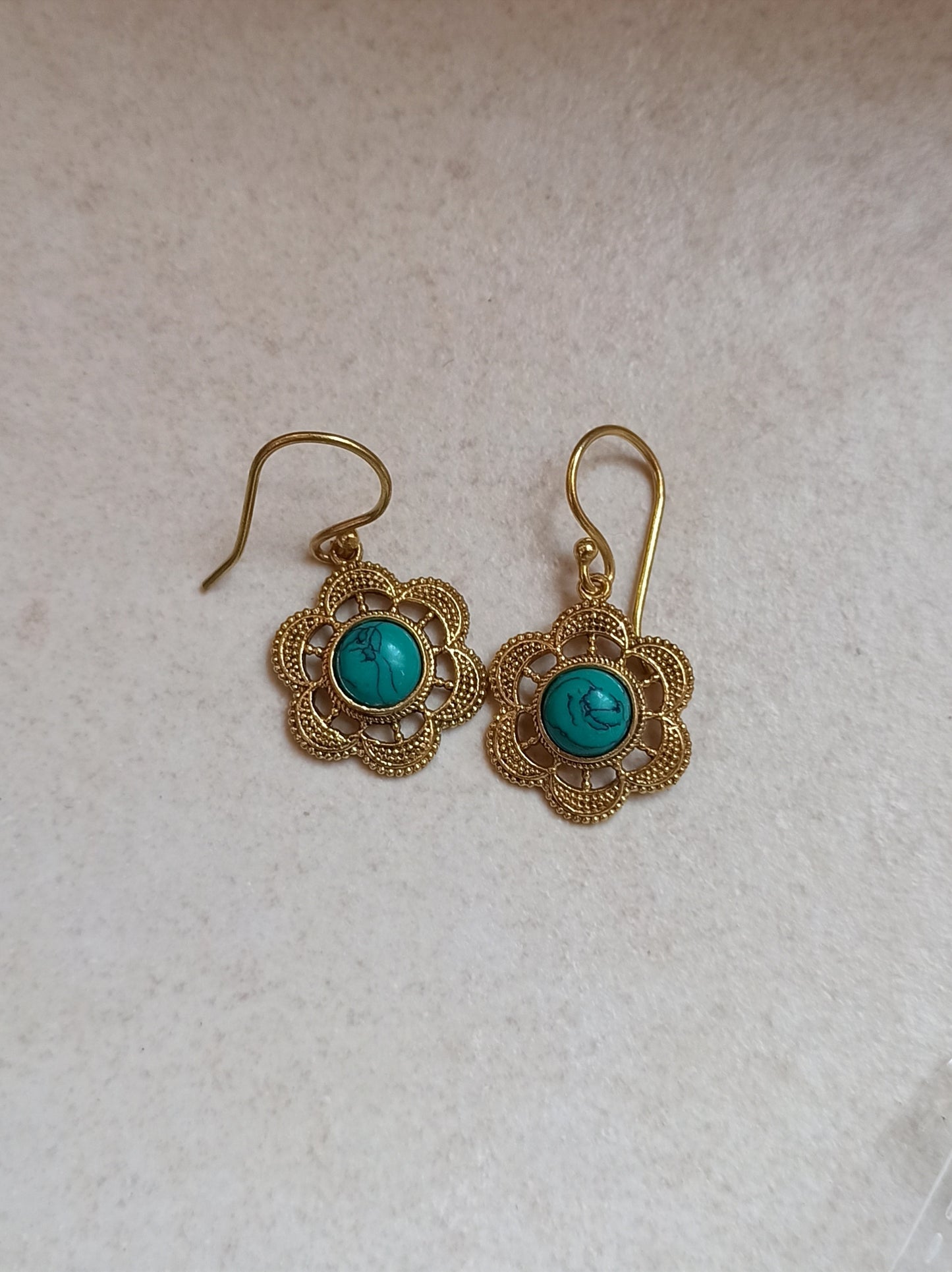 Golden boho earrings with turquoise flower