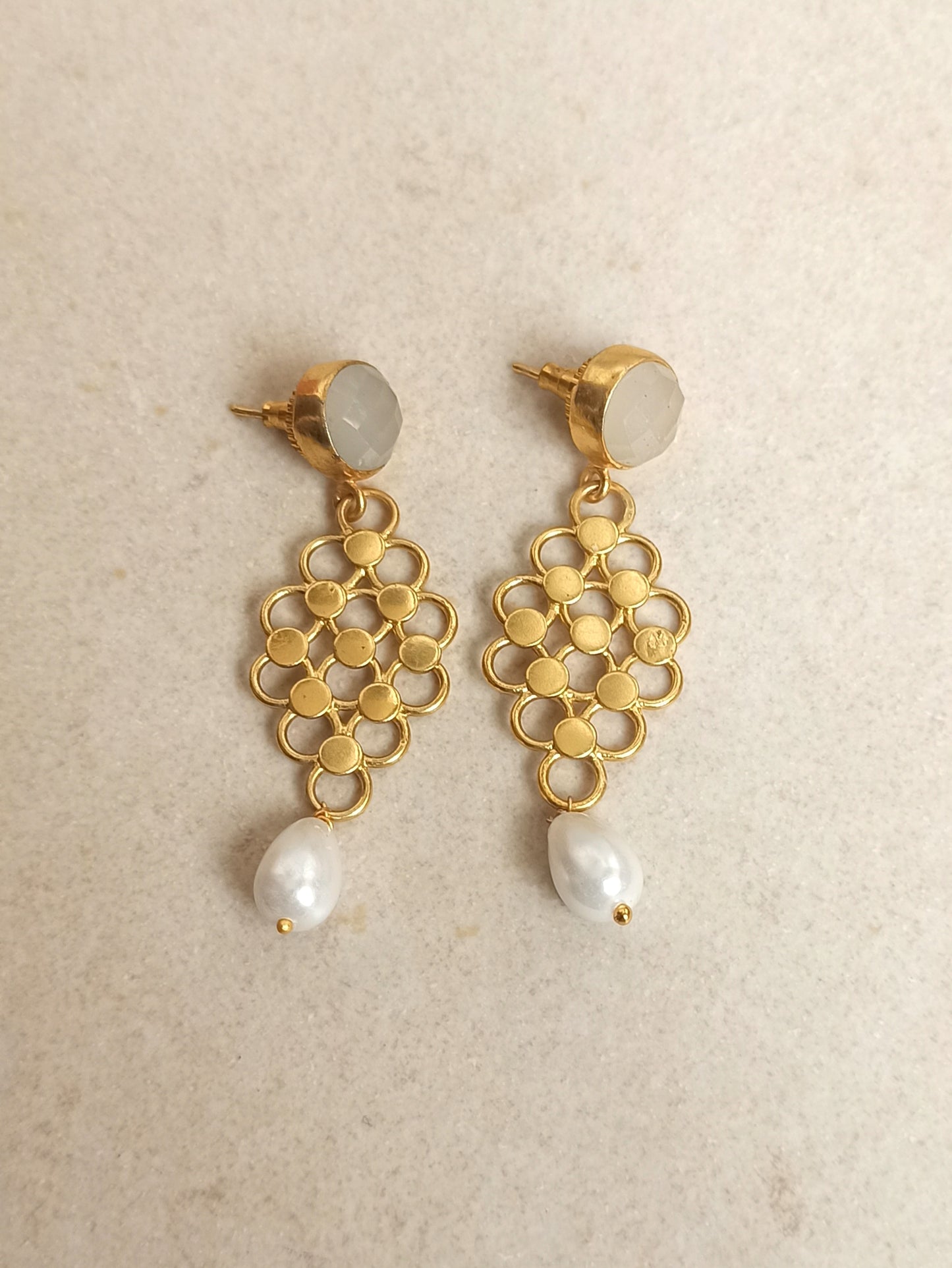 Golden earrings with ice holes