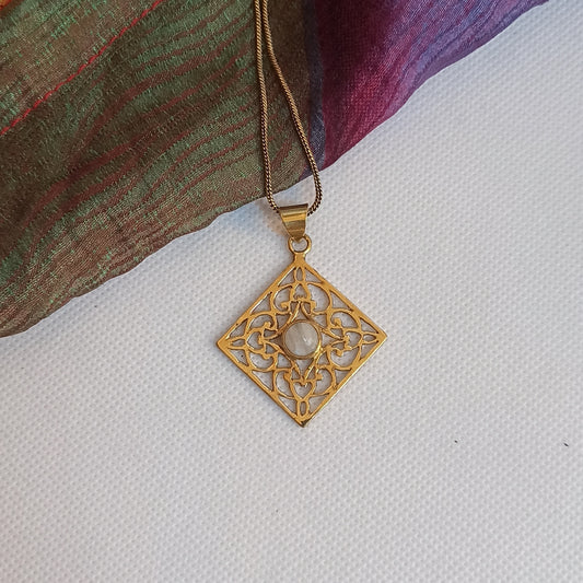 Golden necklace with moonstone rhombus pendant