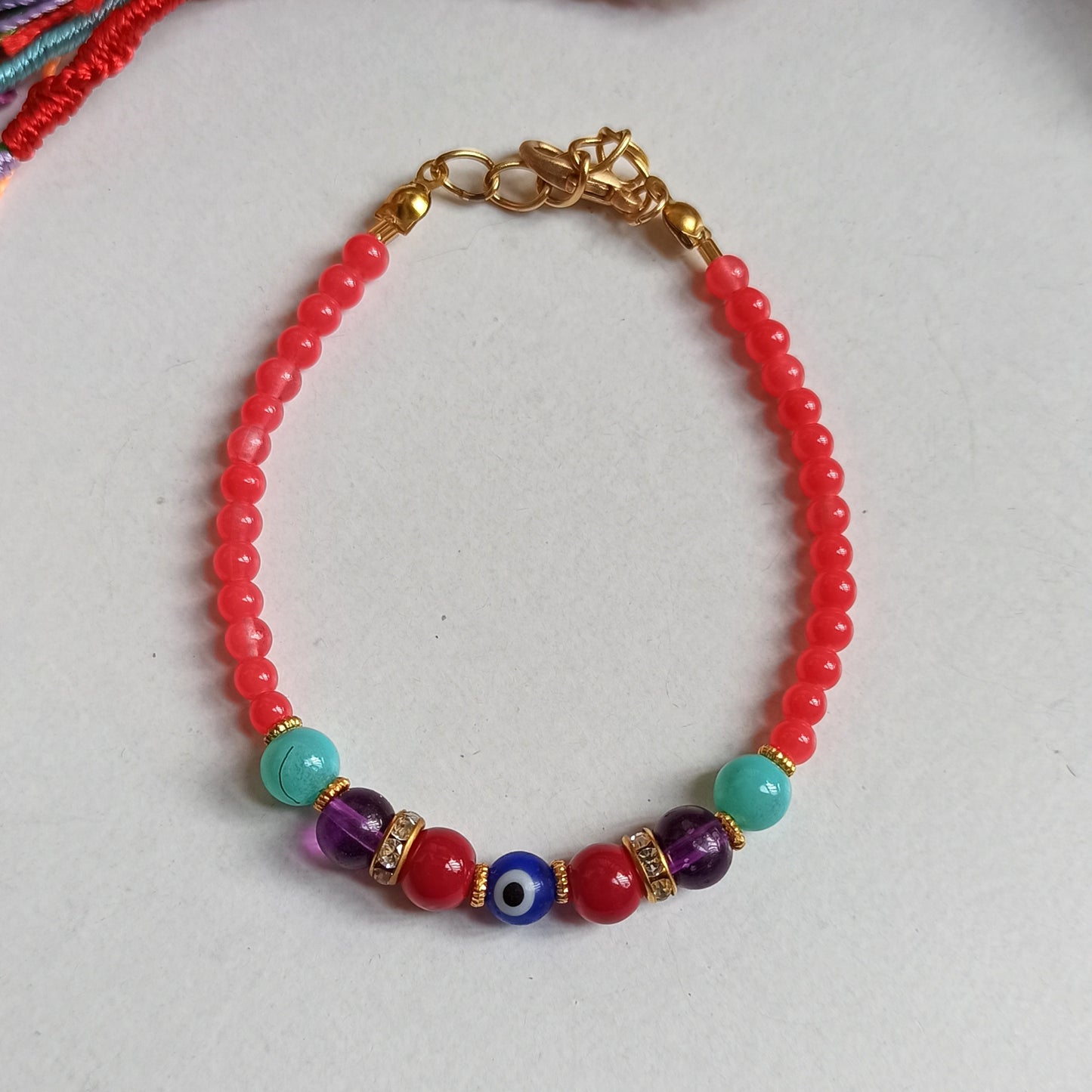 Thin red balls bracelet