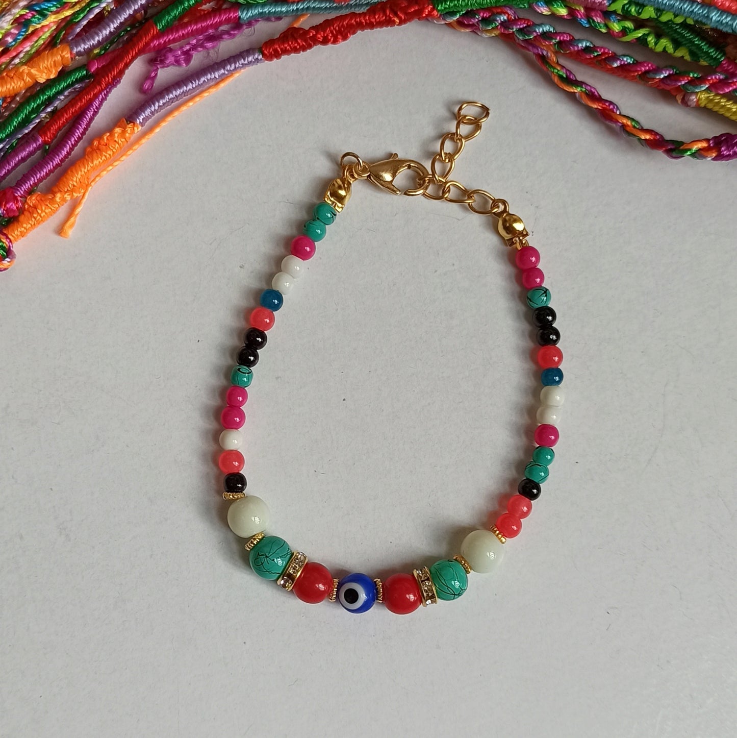 Thin bracelet with multicolored balls