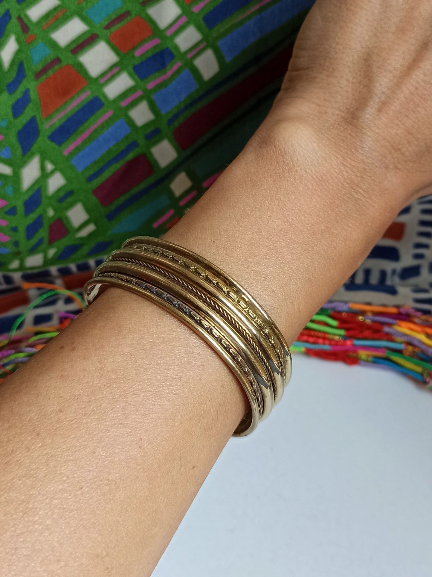 Thin golden bangle bracelet with 3 rows