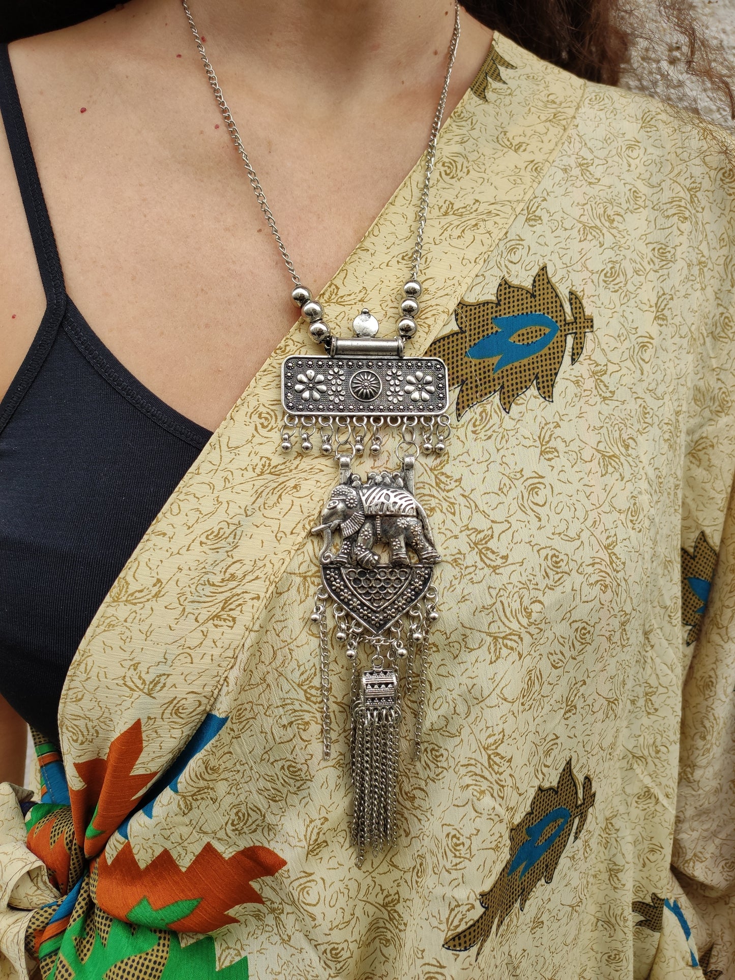 Necklace set and earrings long pendant metal medallion silver peacock India