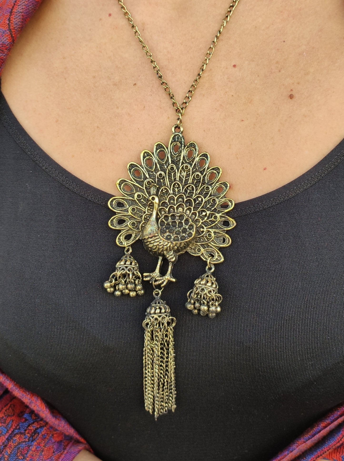 Long gold peacock medallion metal pendant necklace India