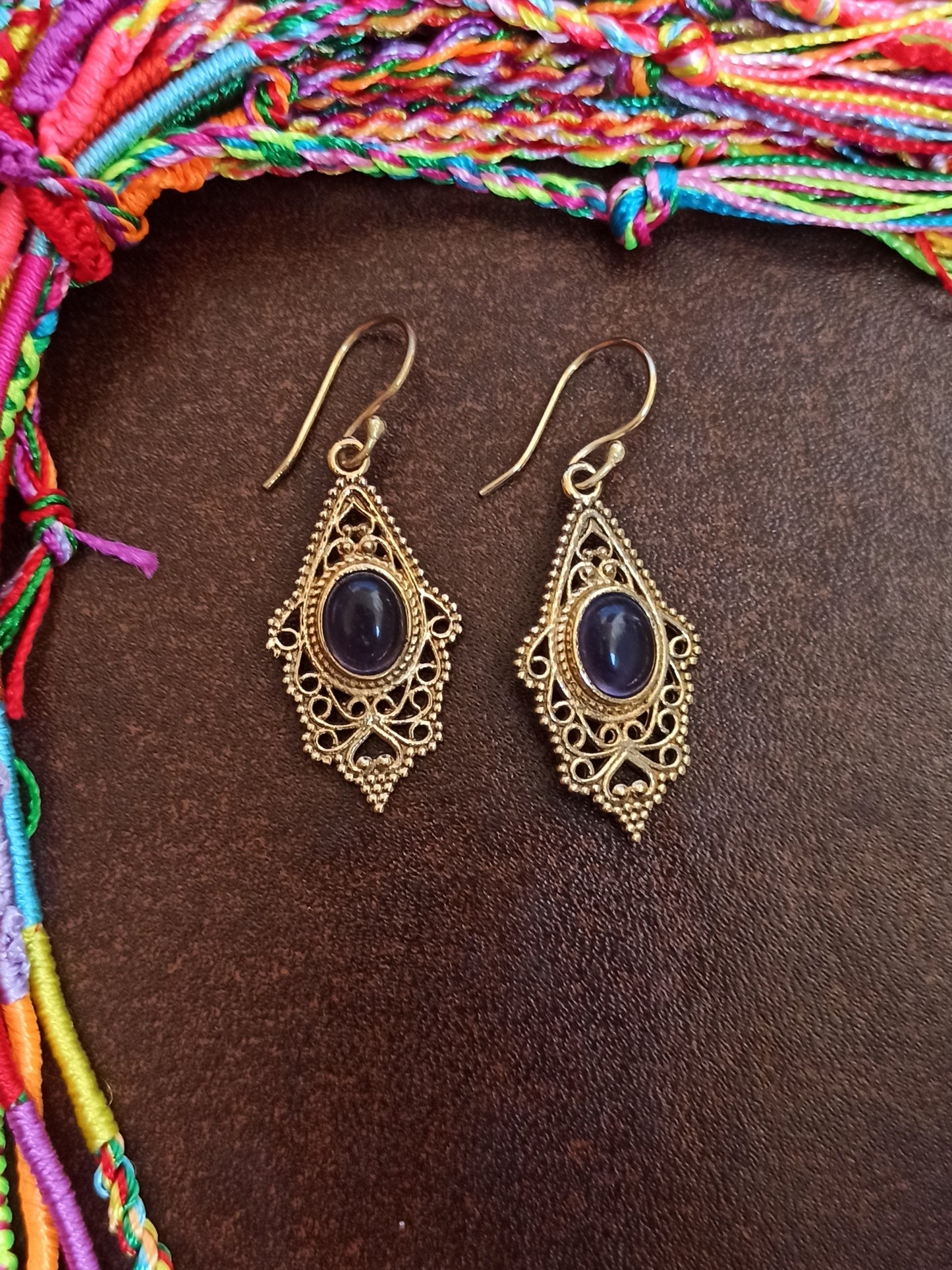 Golden boho earrings with purple lace rhombuses