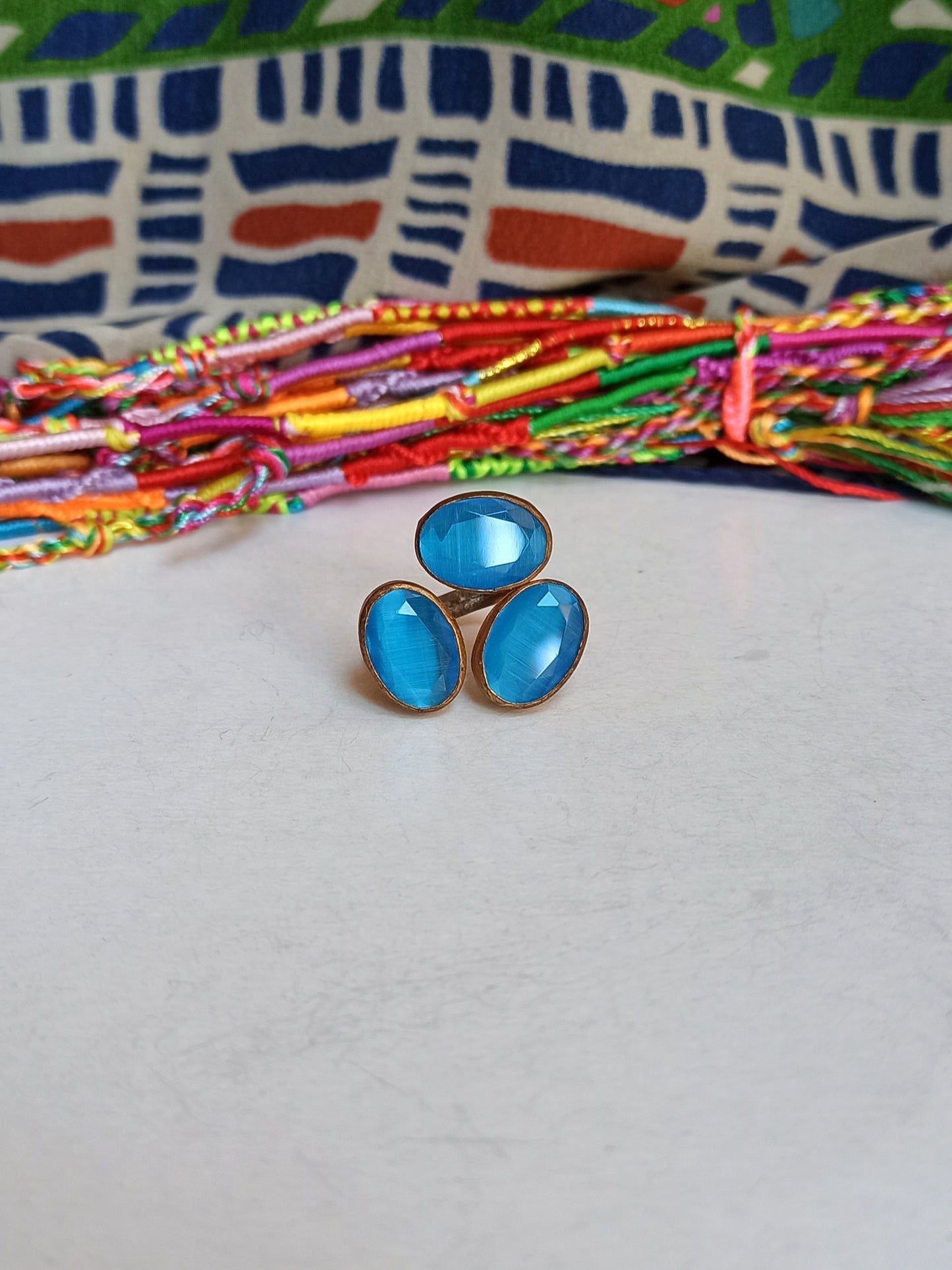 Golden ring with 3 turquoise stones