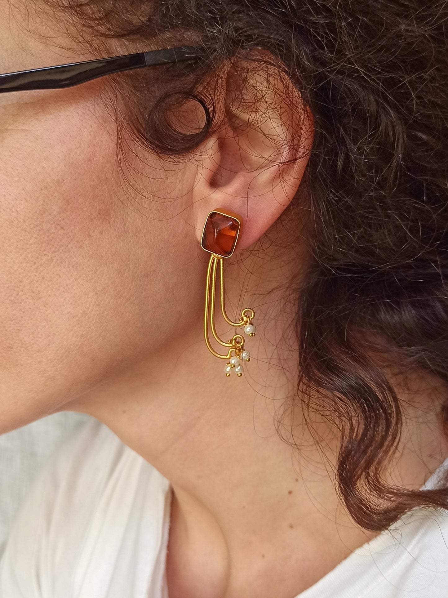 Golden dangling earrings