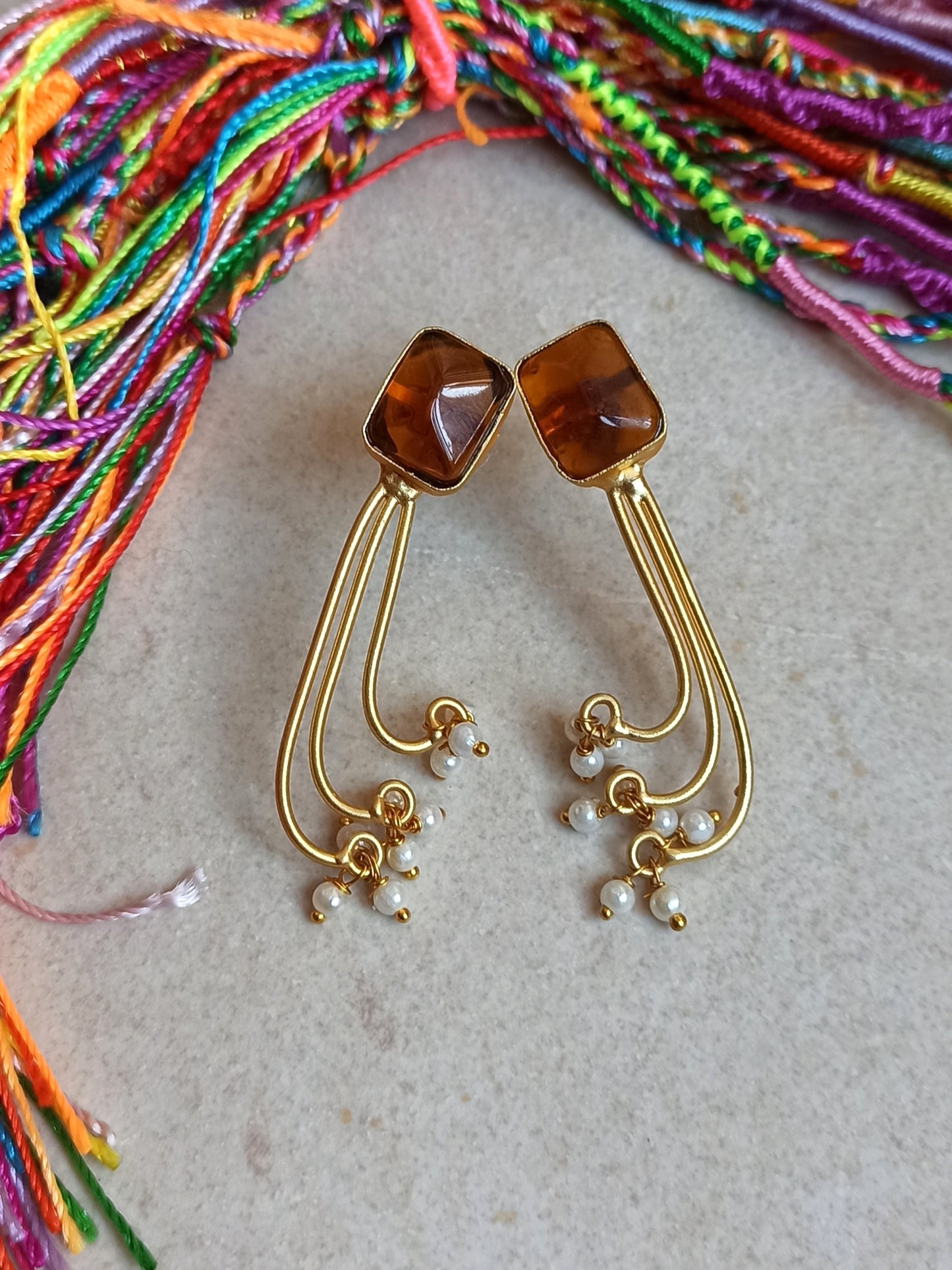 Golden dangling earrings