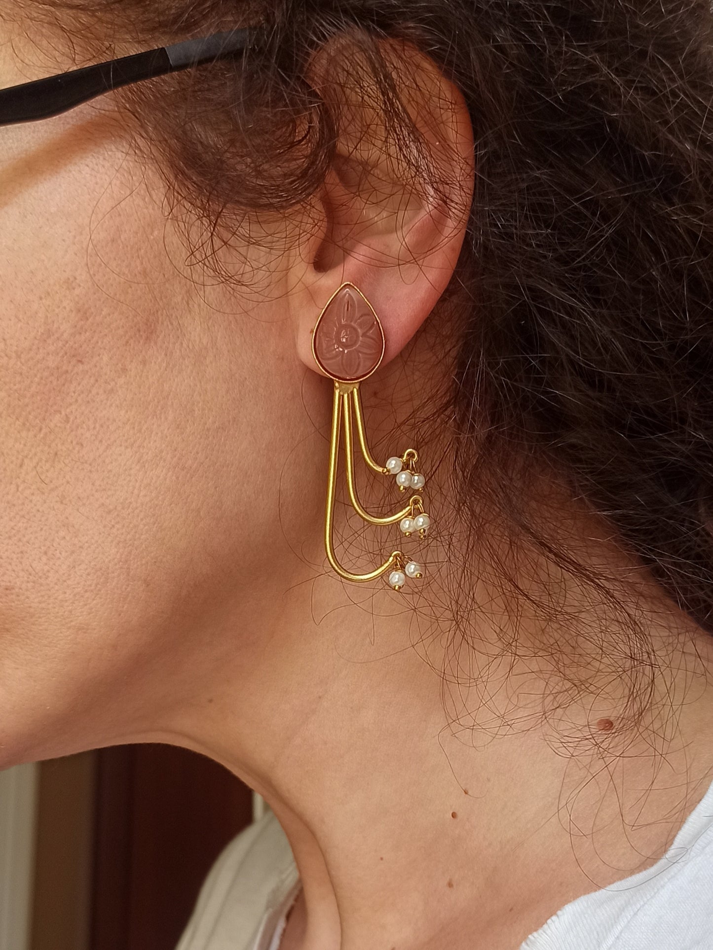 Pink dangling golden earrings