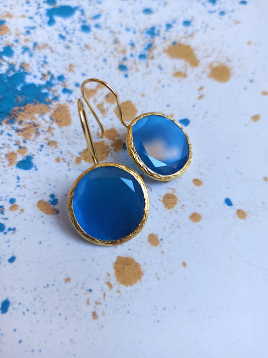 Round light blue stone earrings