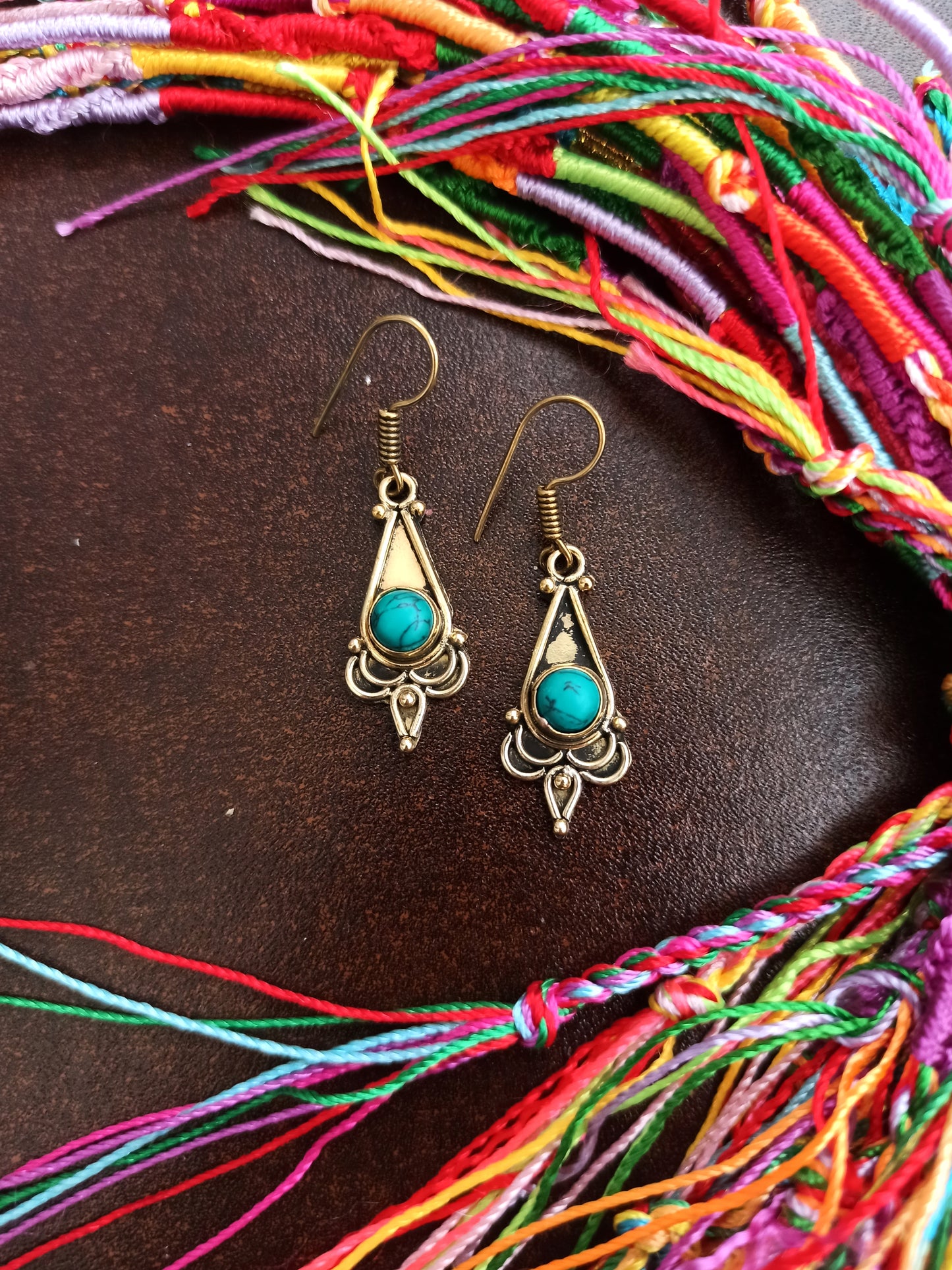 Golden boho earrings with turquoise lotus tip